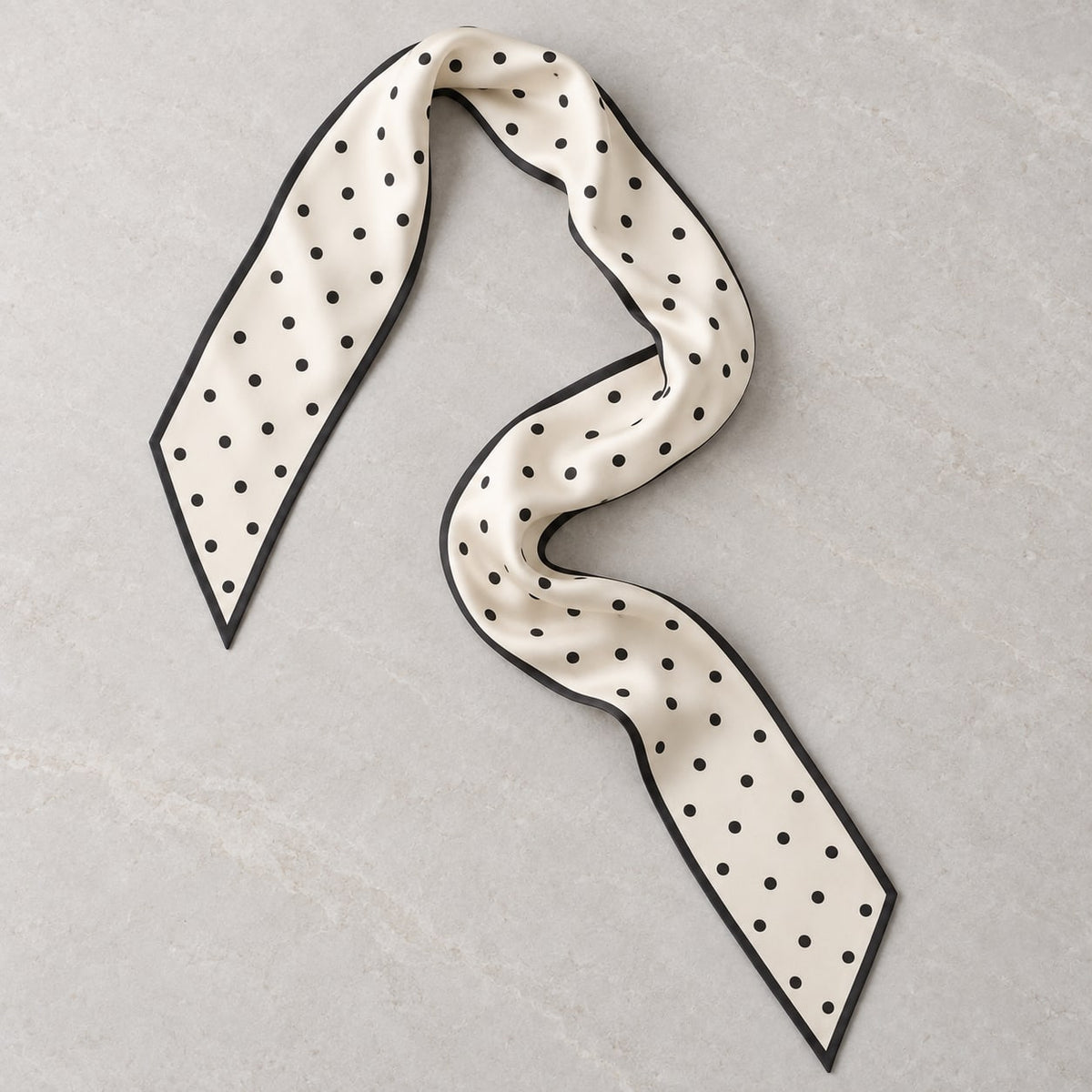Ivory Dot Narrow Scarf: single scarf display or styling concept; props excluded